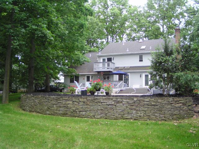 3545 Oakland Road Bethlehem, PA 18020 - Photo 8 of 49 Rear of house showing stone retaining wall at pool