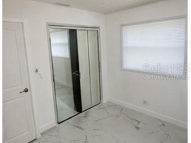 132 Miller Drive Winter Haven, FL 33884 - Photo 11 of 15 an empty room with window