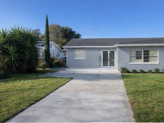 132 Miller Drive Winter Haven, FL 33884 - Photo 15 of 15 a front view of house with yard and green space