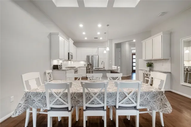 a view of a dining room with furniture