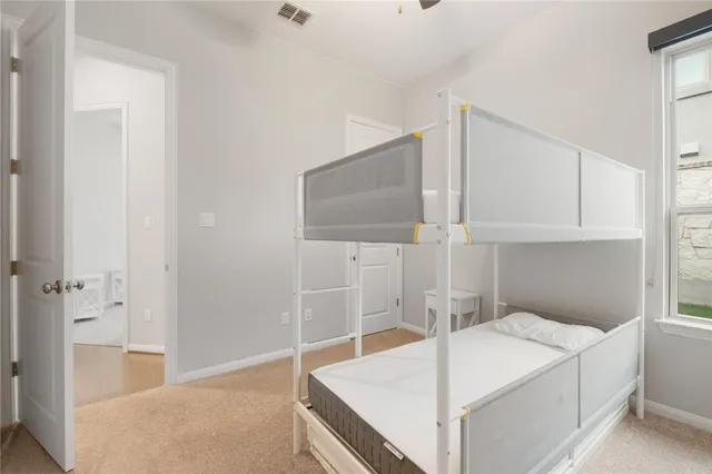 a bathroom with a tub and shower