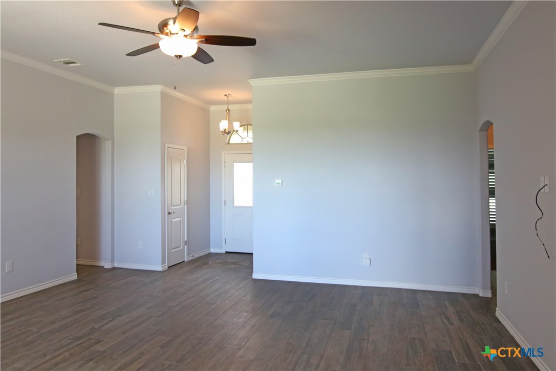 2734 Rock Road Troy, TX 76579 - Photo 14 of 48 wooden floor in an empty room with a window