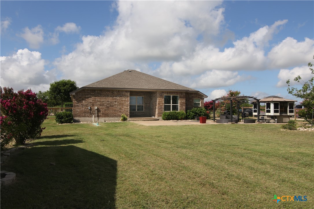 2734 Rock Road Troy, TX 76579 - Photo 36 of 48 a front view of a house with garden