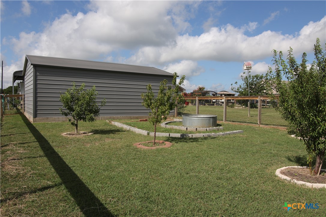 2734 Rock Road Troy, TX 76579 - Photo 40 of 48 a view of a fountain in the backyard of a house