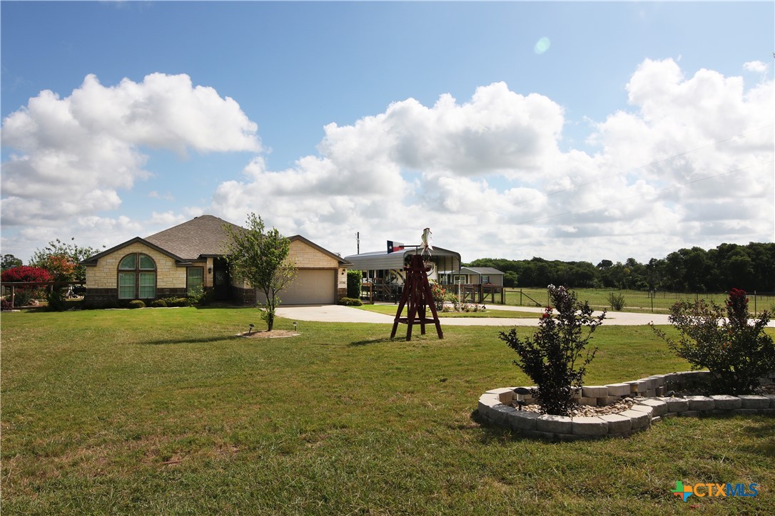2734 Rock Road Troy, TX 76579 - Photo 4 of 48 a view of a lake in front of the house