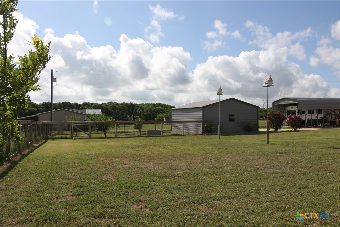 2734 Rock Road Troy, TX 76579 - Photo 41 of 48 a house view with swimming pool and trees in the background