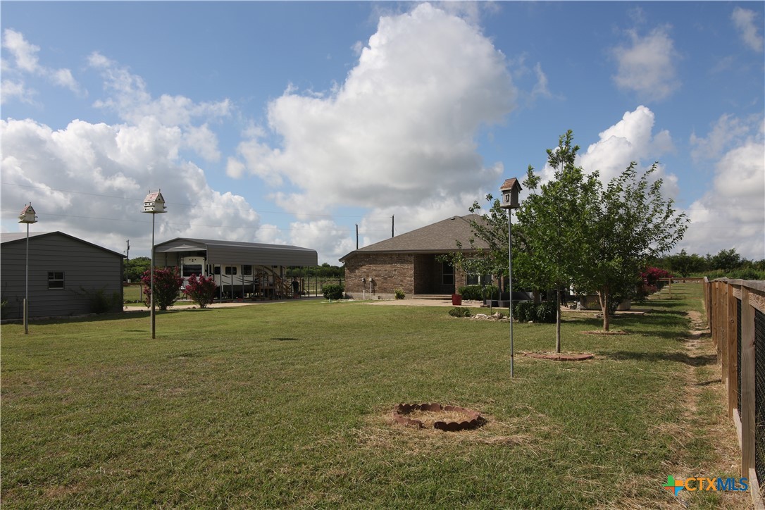 2734 Rock Road Troy, TX 76579 - Photo 42 of 48 a front view of a house with a yard and trees