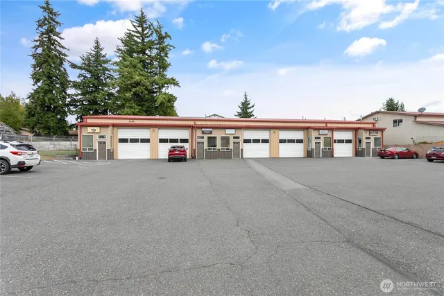 a view of a car parked in front of a building