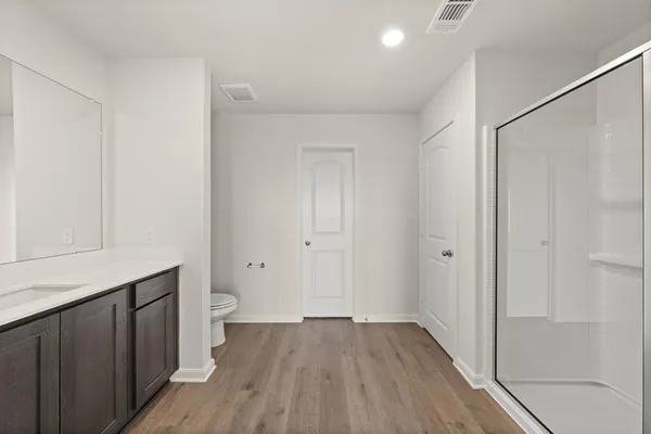 a view of bathroom with a sink toilet and tub
