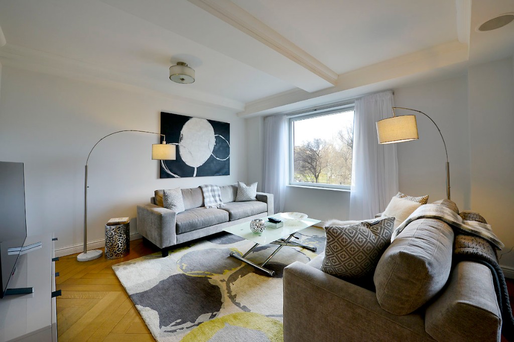 160 Central Park South, Unit 414 Manhattan, NY 10019 - Photo 5 of 12 a living room with furniture and window