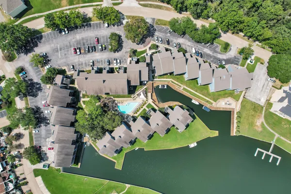an aerial view of a house with a garden