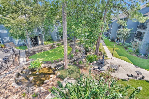 a view of a garden with a slide