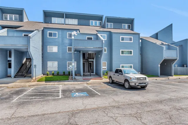 a car parked in front of a building