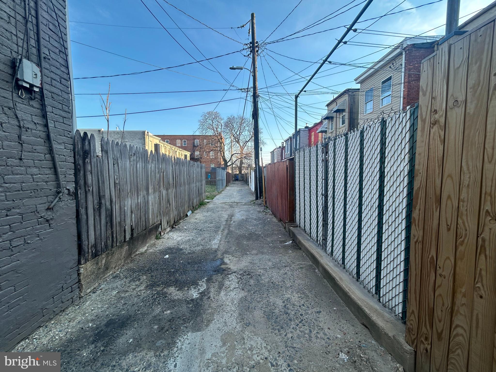 307 South Mount Street Baltimore, MD 21223 - Photo 15 of 17 a view of a backyard with wooden fence