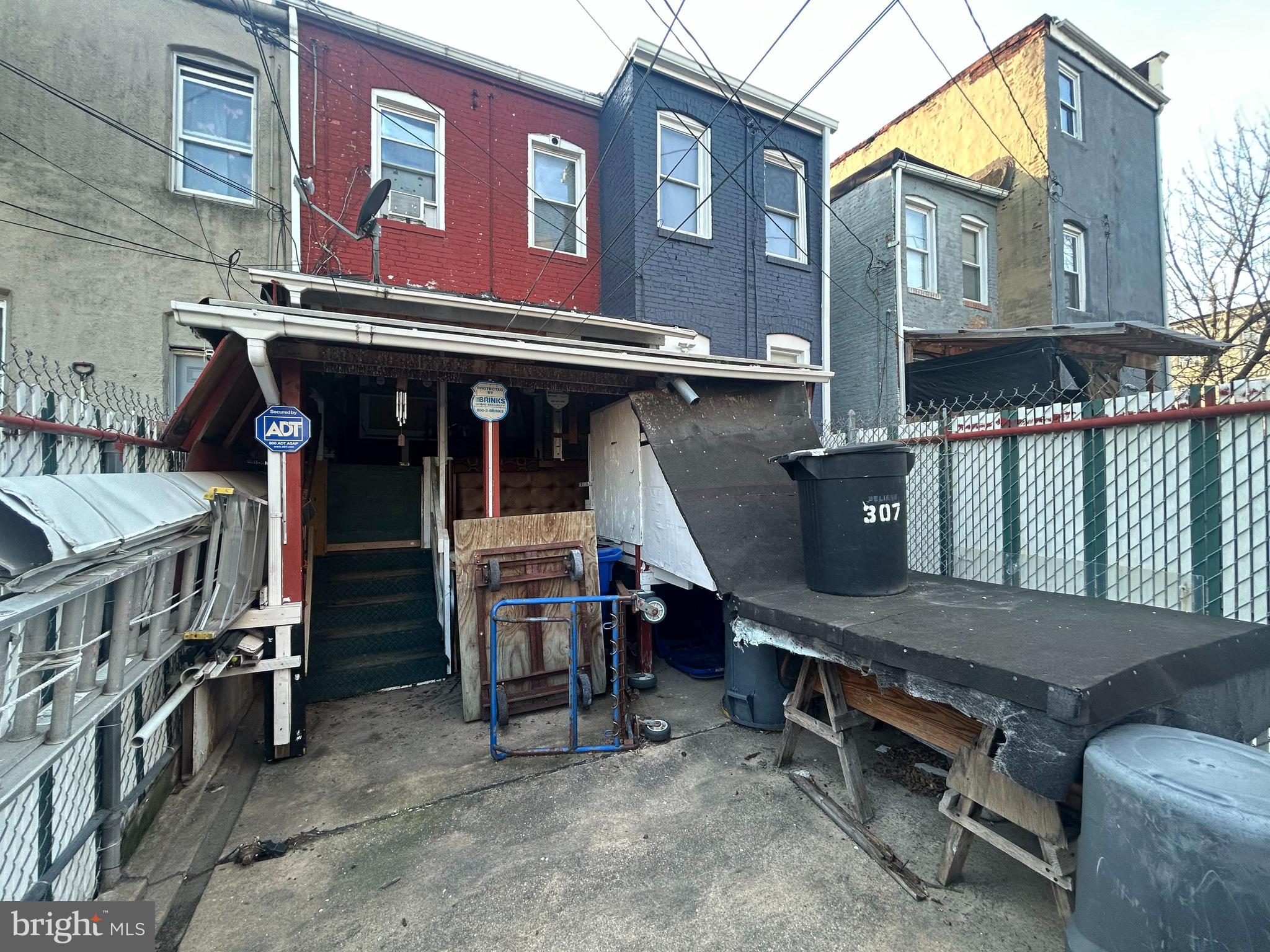 307 South Mount Street Baltimore, MD 21223 - Photo 16 of 17 a view of a dinning table and chairs in the room