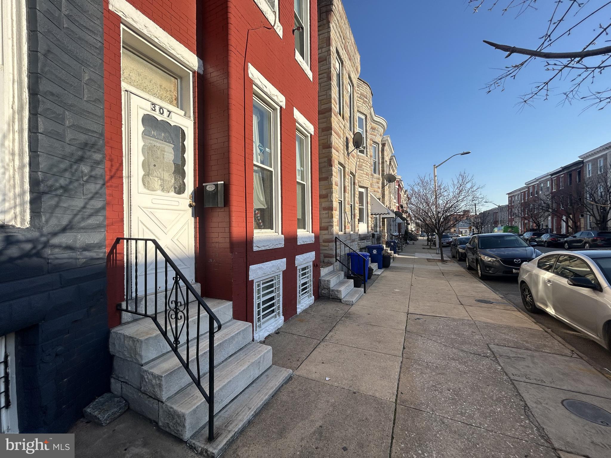 307 South Mount Street Baltimore, MD 21223 - Photo 3 of 17 a view of a brick buildings with entryway doors