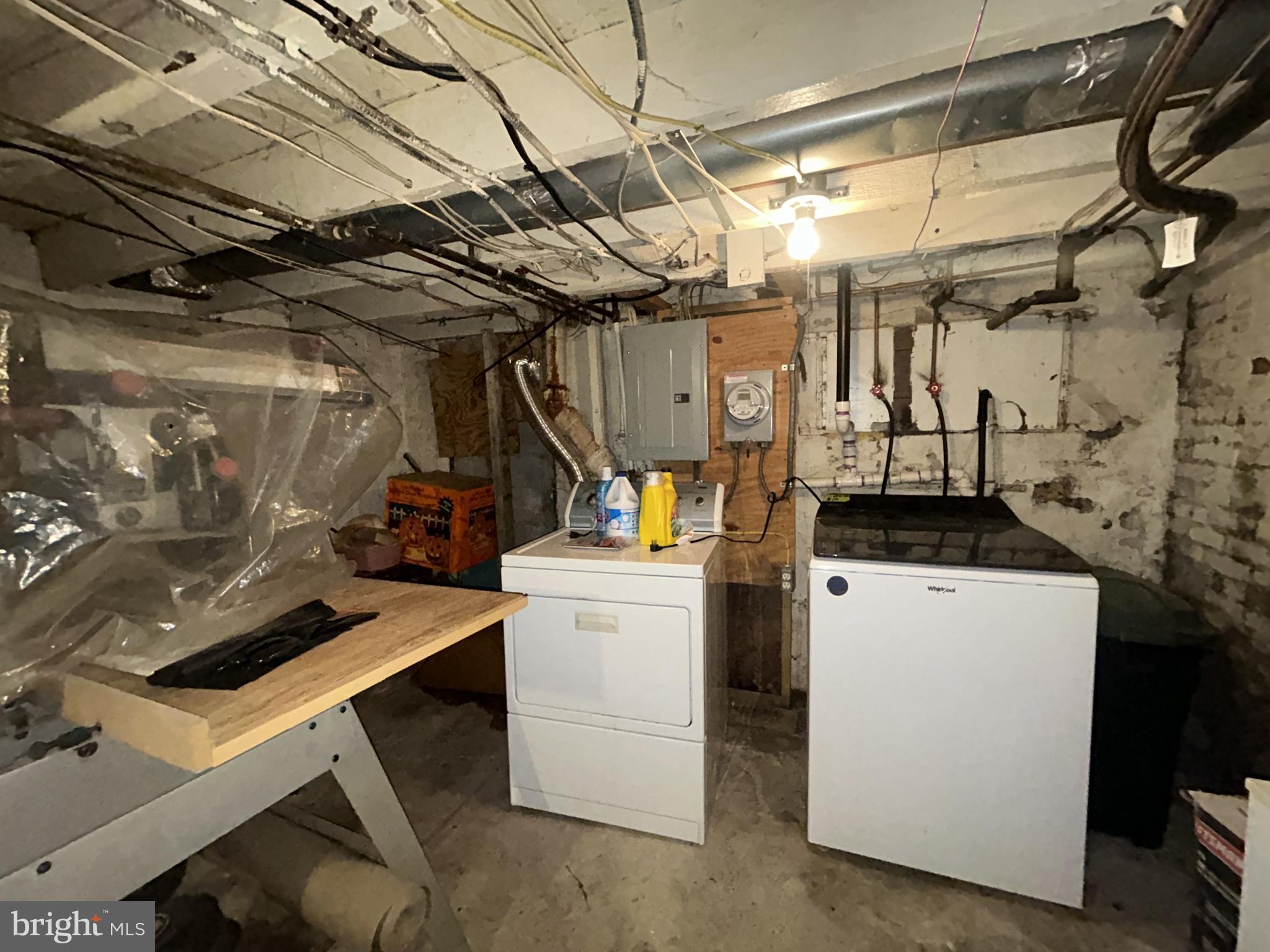 307 South Mount Street Baltimore, MD 21223 - Photo 10 of 17 a view of storage and utility room with washer and dryer