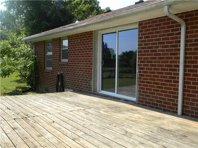 5049 Pickering Road Clarksville, TN 37043 - Photo 5 of 19 12X21 back deck, new sliding doors into dining area.