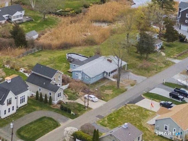 18 Old South Cove Road Old Saybrook, CT 06475 - Photo 5 of 9 an aerial view of a house with a yard