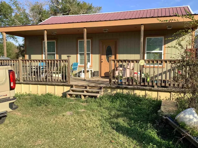 a house view with a garden space