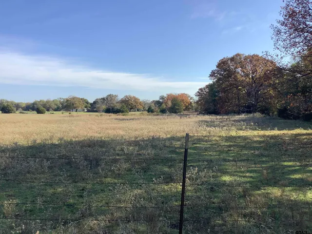 a view of a terrace with a lake view