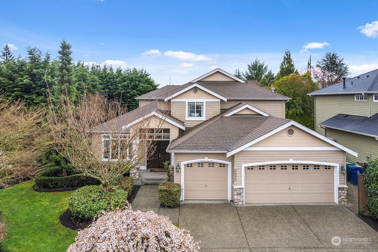 3930 208th Place Southeast Bothell, WA 98021 - Photo 1 of 36 a view of a white house with a yard and potted plants