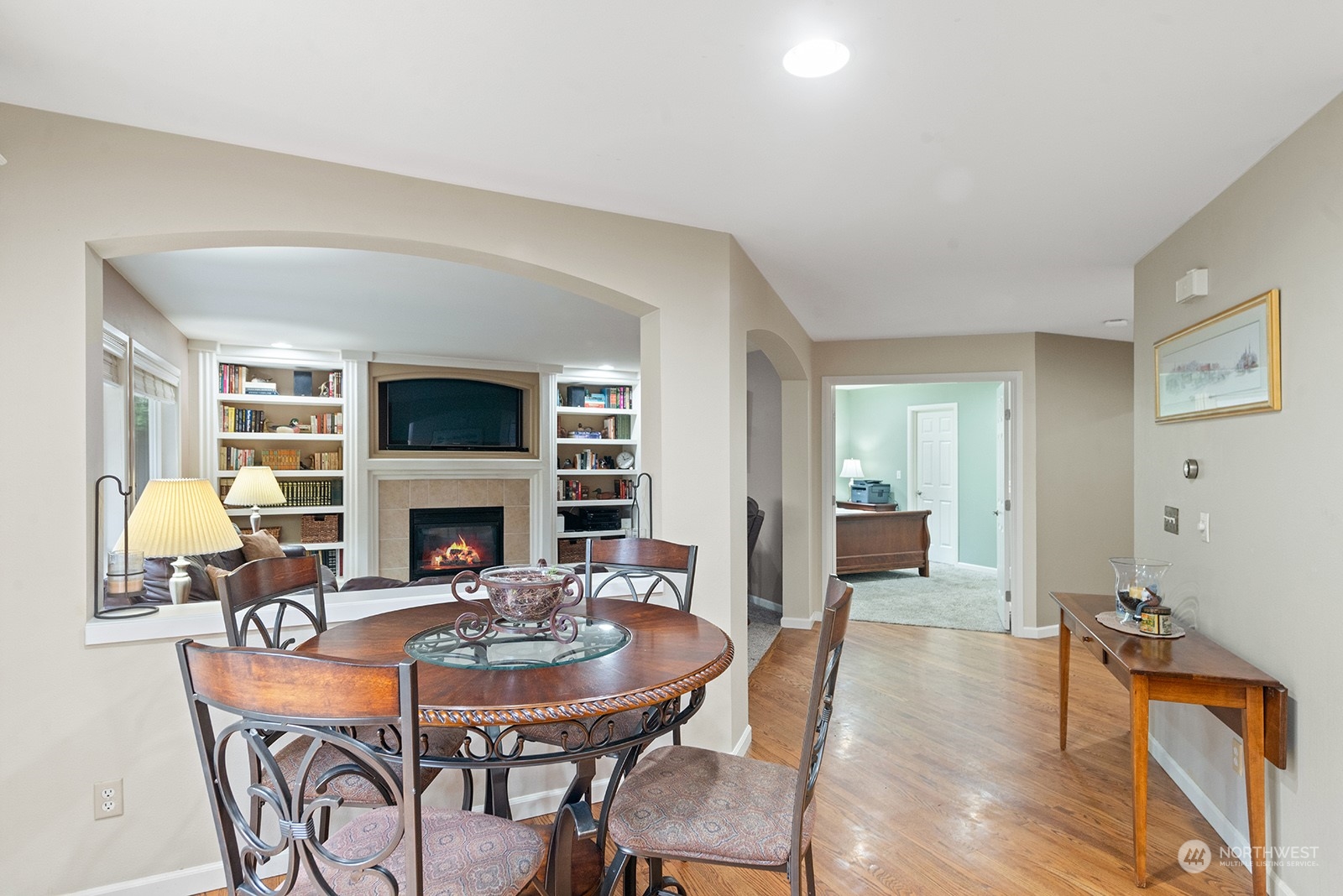 3930 208th Place Southeast Bothell, WA 98021 - Photo 12 of 36 a living room with furniture a fireplace and a table