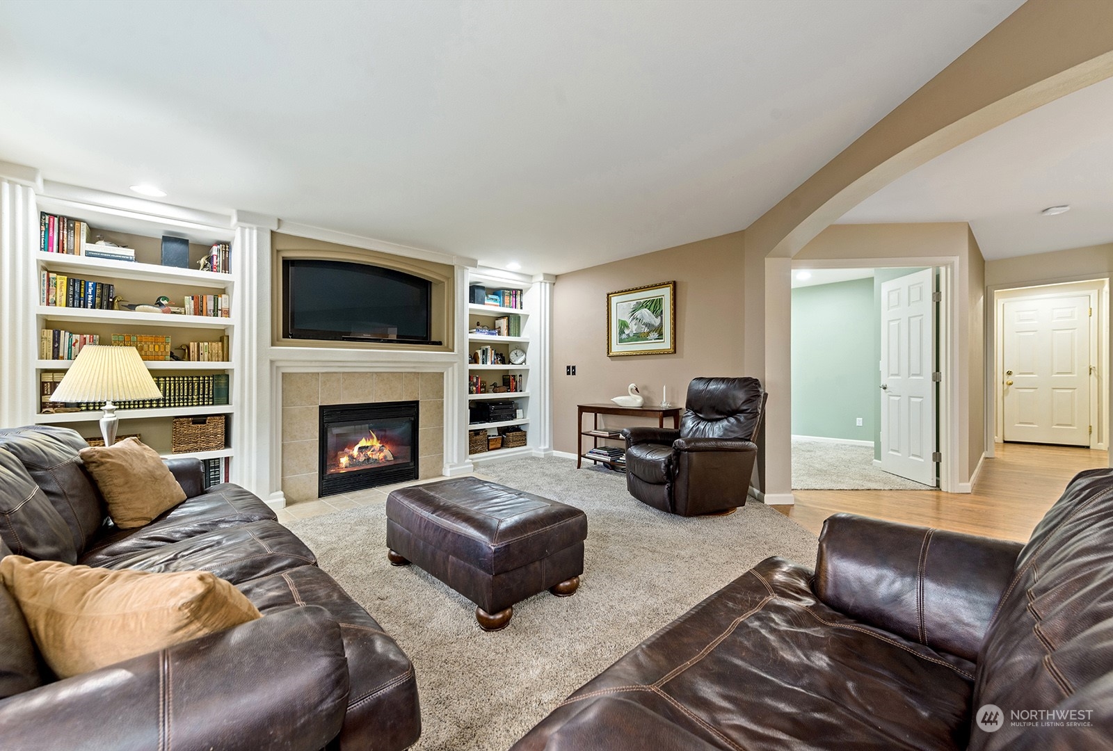 3930 208th Place Southeast Bothell, WA 98021 - Photo 15 of 36 a living room with furniture fireplace and a flat screen tv