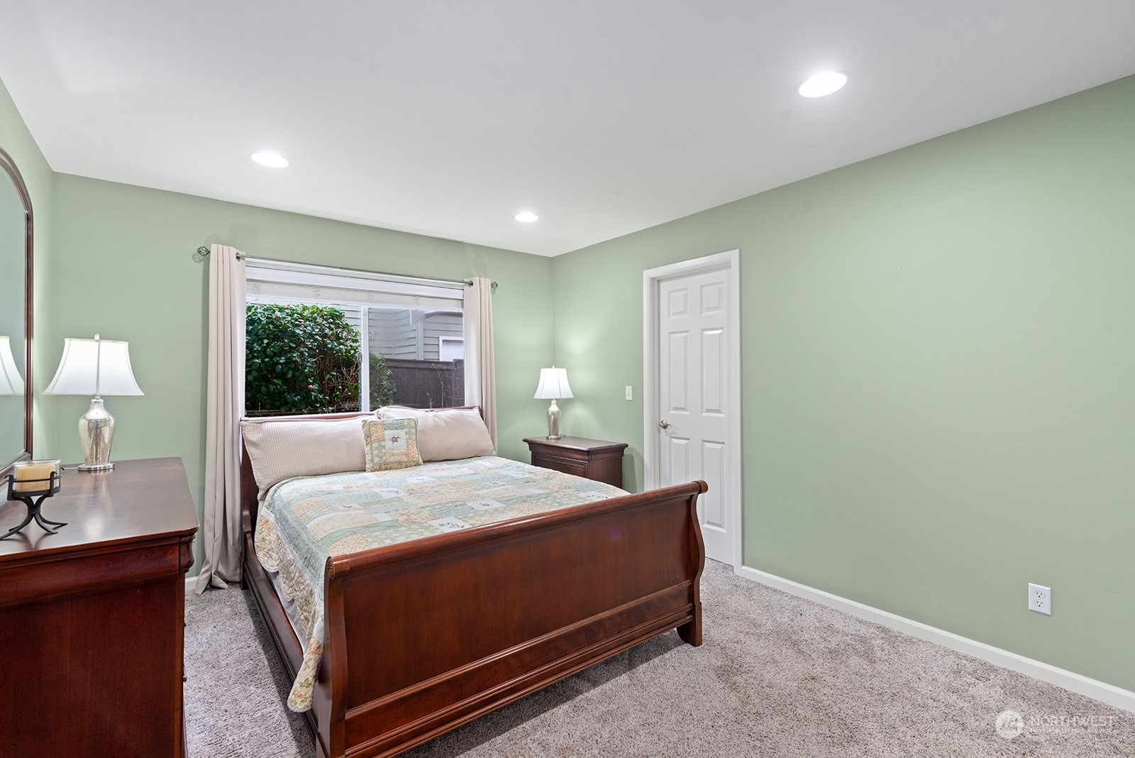 3930 208th Place Southeast Bothell, WA 98021 - Photo 16 of 36 a bedroom with a large bed and a window