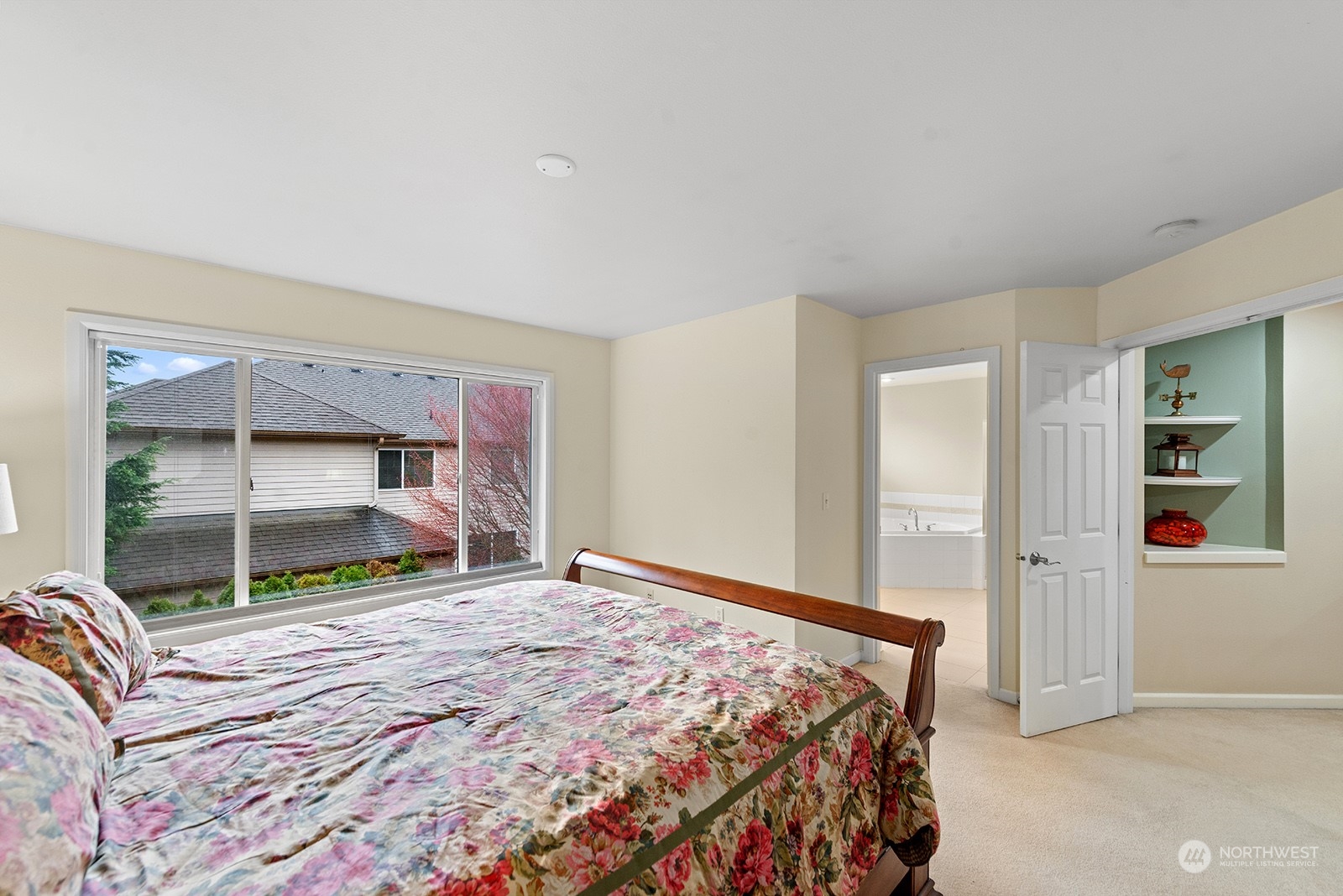 3930 208th Place Southeast Bothell, WA 98021 - Photo 23 of 36 a bedroom with a bed and a window