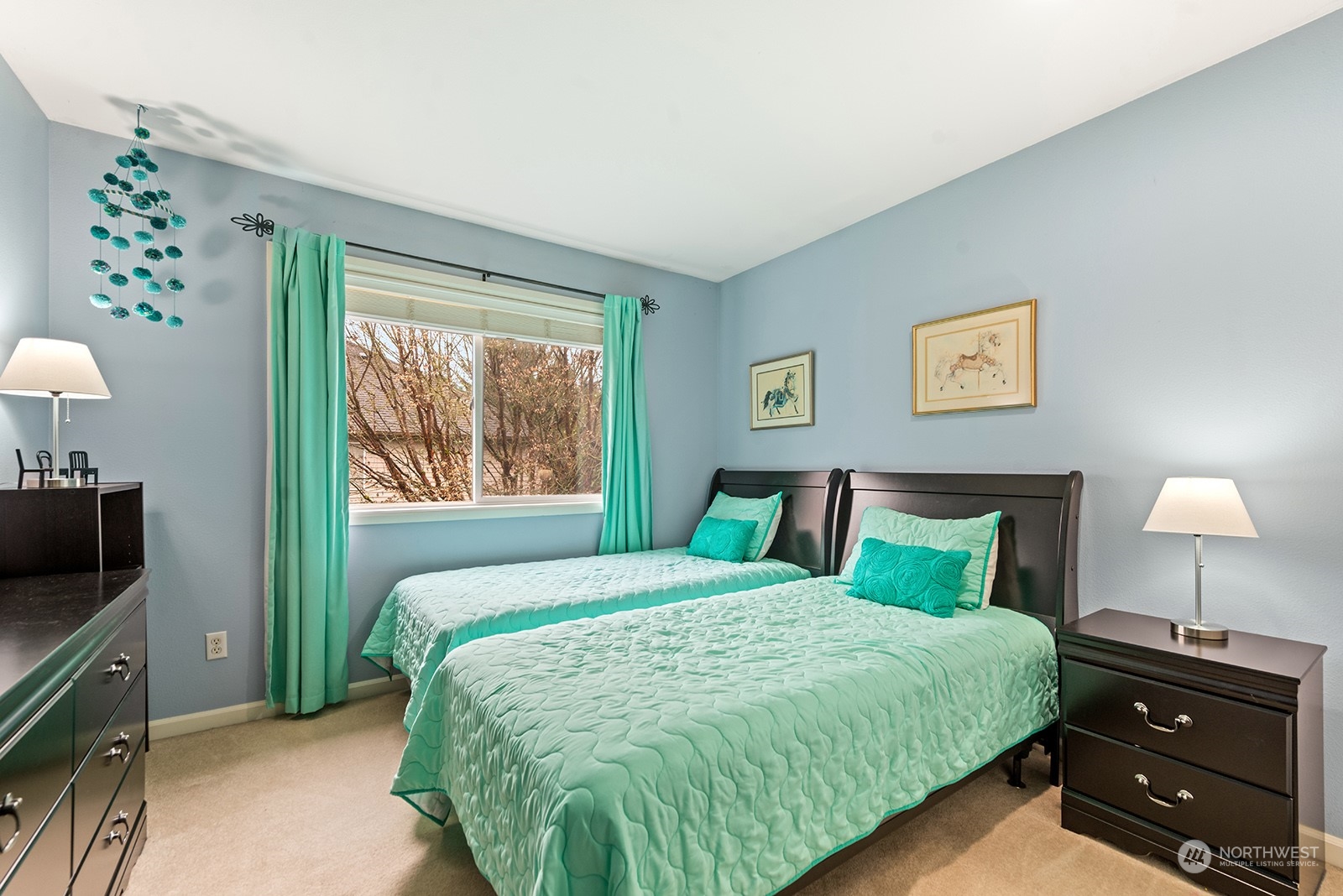 3930 208th Place Southeast Bothell, WA 98021 - Photo 31 of 36 a bedroom with a bed and a tv