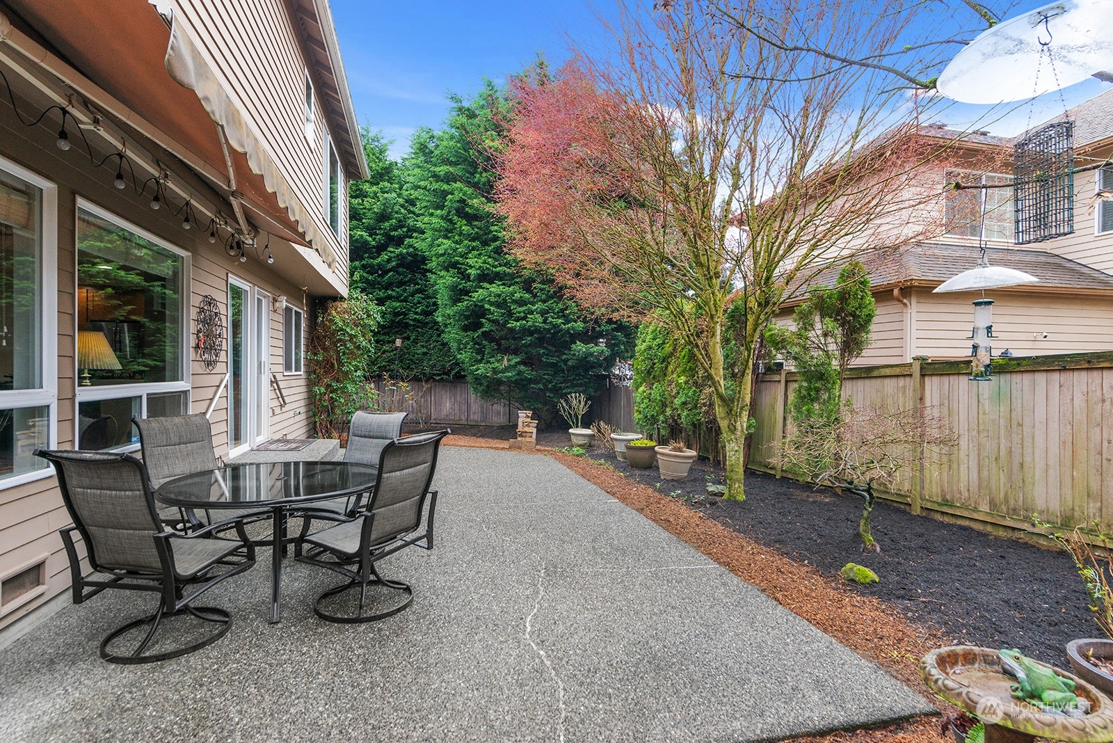 3930 208th Place Southeast Bothell, WA 98021 - Photo 33 of 36 a view of a backyard with sitting area and furniture