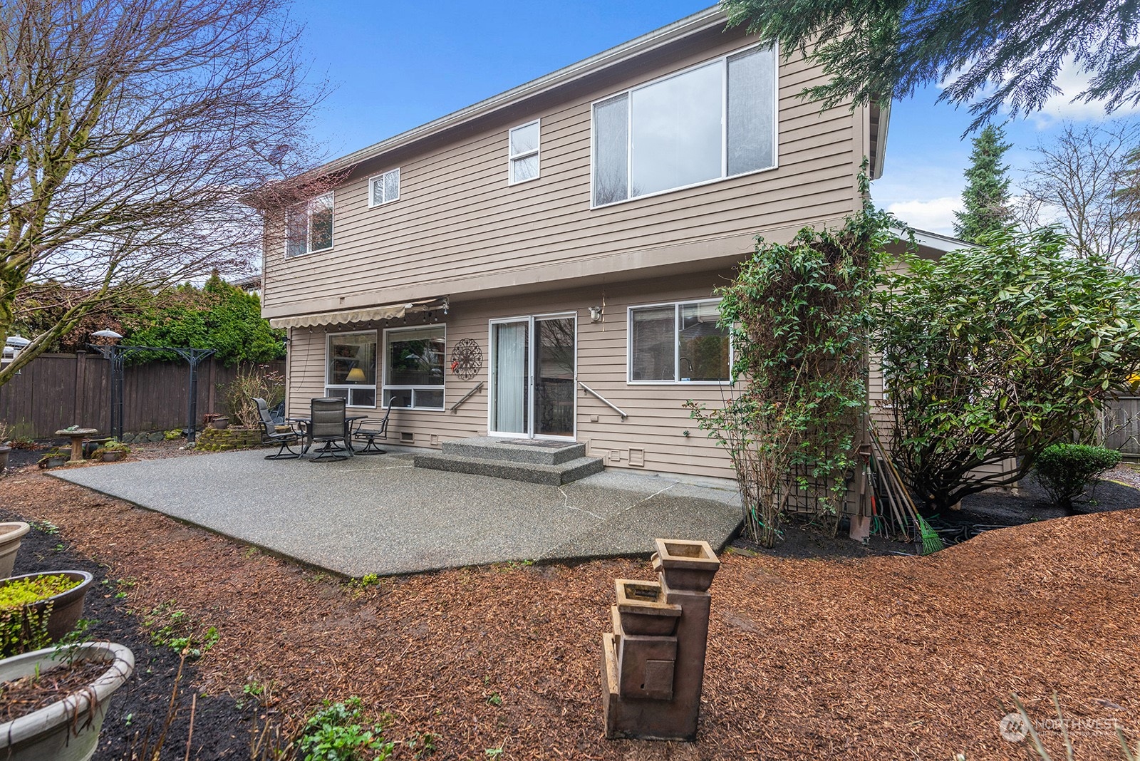 3930 208th Place Southeast Bothell, WA 98021 - Photo 34 of 36 a view of a house with backyard and sitting area