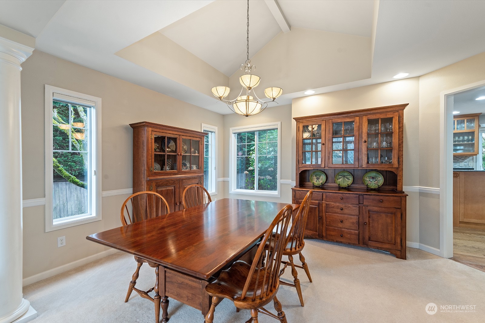 3930 208th Place Southeast Bothell, WA 98021 - Photo 7 of 36 a dining room with furniture a chandelier and window