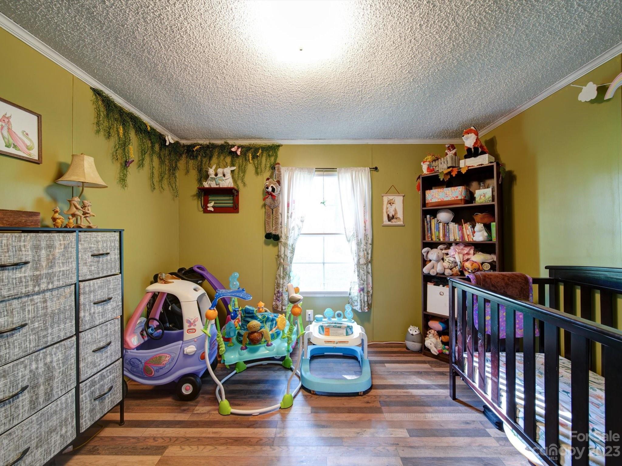 1265 Polk Ford Road Stanfield, NC 28163 - Photo 29 of 40 a room with lots of stuff and plants