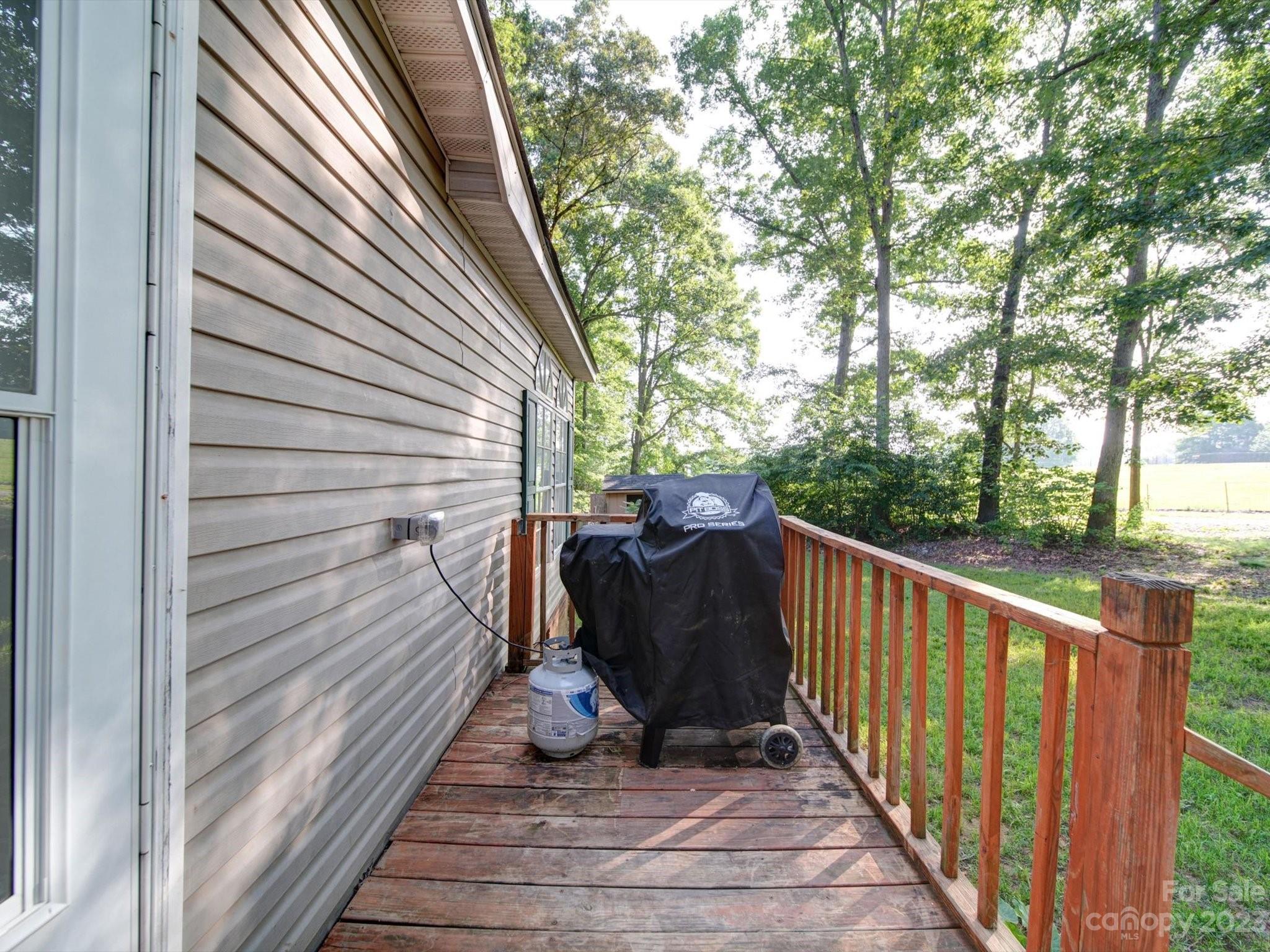 1265 Polk Ford Road Stanfield, NC 28163 - Photo 35 of 40 a view of a two chairs in the balcony