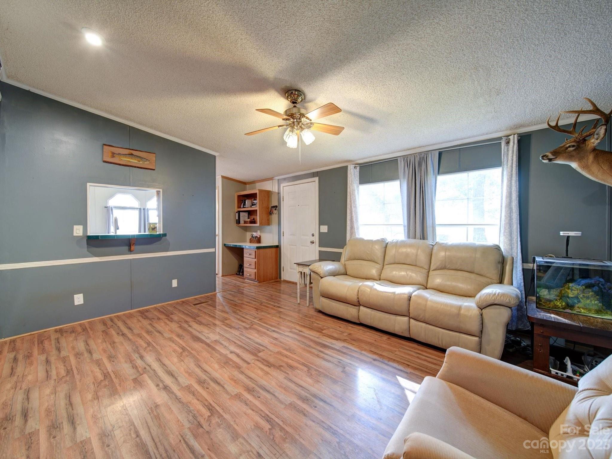 1265 Polk Ford Road Stanfield, NC 28163 - Photo 6 of 40 a living room with furniture and a window
