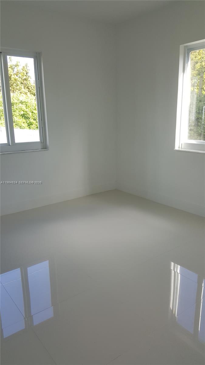 6300 Southwest 21st Street, Unit 1 Miami, FL 33155 - Photo 15 of 33 a view of room and window