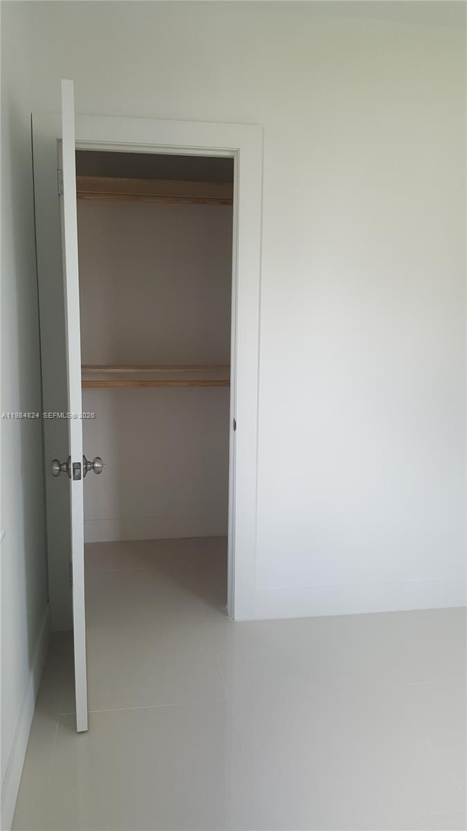 6300 Southwest 21st Street, Unit 1 Miami, FL 33155 - Photo 22 of 33 a view of an empty room