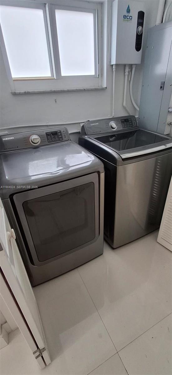 6300 Southwest 21st Street, Unit 1 Miami, FL 33155 - Photo 25 of 33 a stove top oven sitting inside of a kitchen