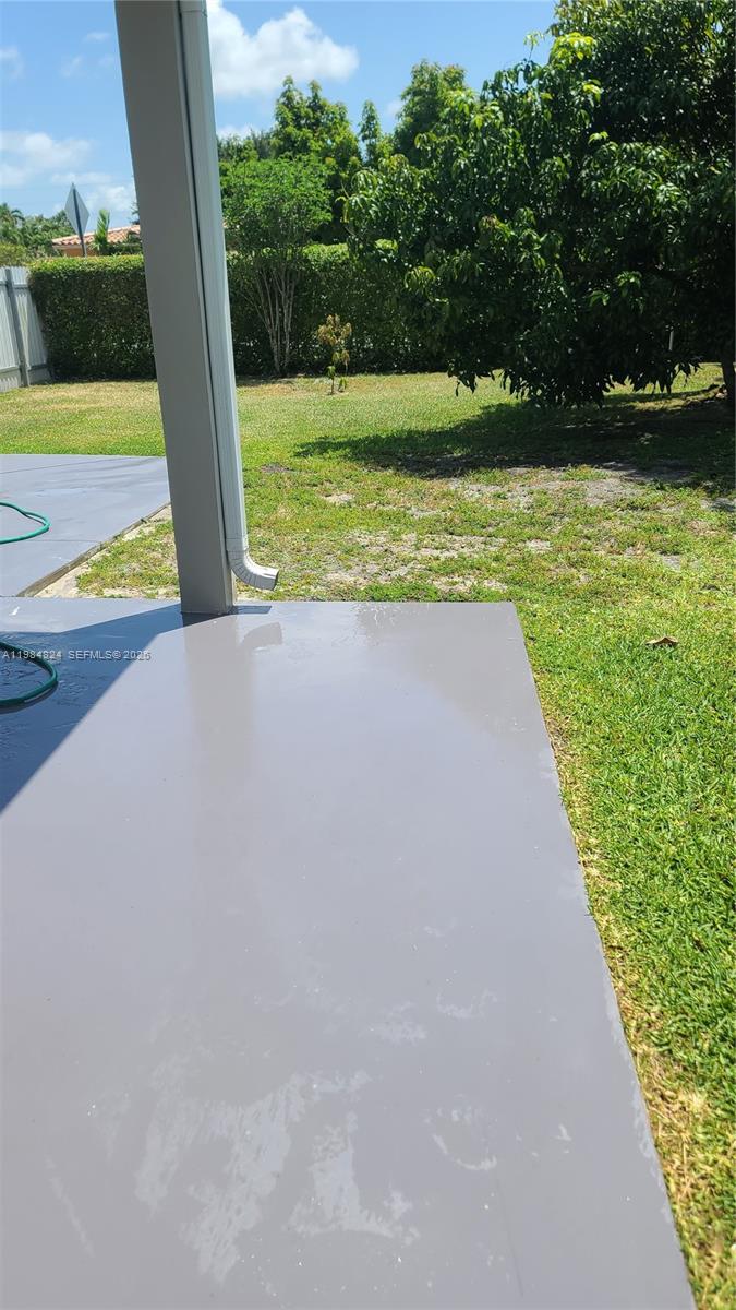 6300 Southwest 21st Street, Unit 1 Miami, FL 33155 - Photo 28 of 33 a view of swimming pool with a yard