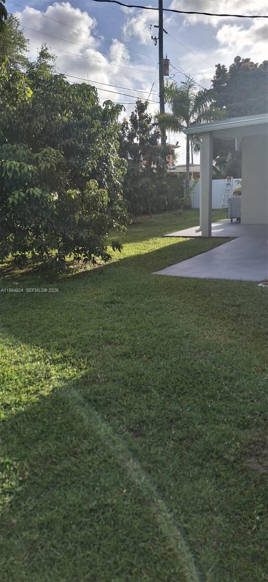 6300 Southwest 21st Street, Unit 1 Miami, FL 33155 - Photo 29 of 33 a view of a lake with a big yard