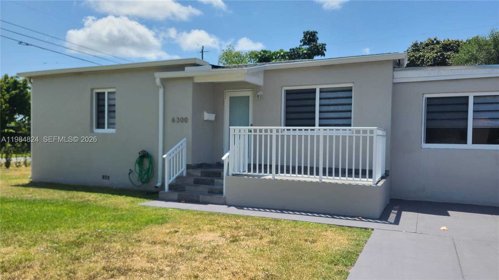 6300 Southwest 21st Street, Unit 1 Miami, FL 33155 - Photo 3 of 33 a view of a house with a backyard