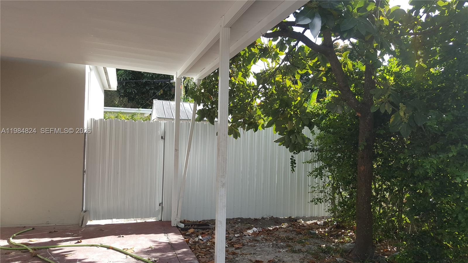 6300 Southwest 21st Street, Unit 1 Miami, FL 33155 - Photo 33 of 33 a bed room with a tree