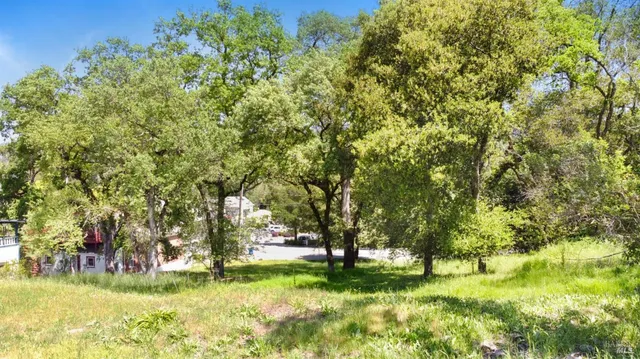 a view of a lake with mountains in the background