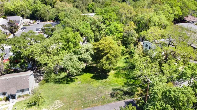 a view of a house with a flower garden