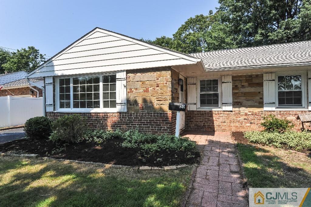 20 Stevens Road Edison, NJ 08817 - Photo 2 of 22 a front view of a house with garden