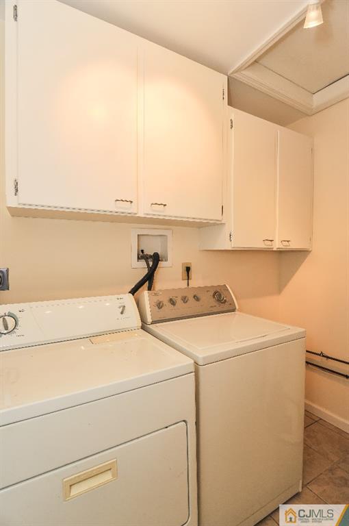 20 Stevens Road Edison, NJ 08817 - Photo 10 of 22 a utility room with dryer and washer