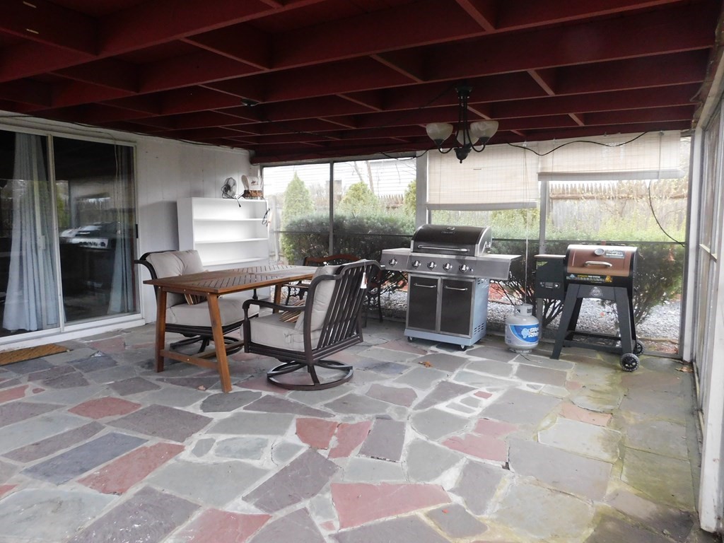44 Delmar Road Brockton, MA 02302 - Photo 15 of 19 a view of a dining space with a table and chairs