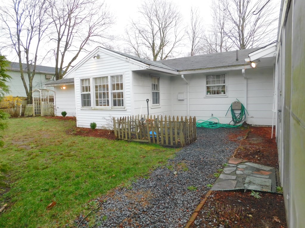 44 Delmar Road Brockton, MA 02302 - Photo 16 of 19 a front view of a house with garden